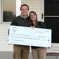 Logan & Maggie are all smiles receiving their $1,790 in cashback